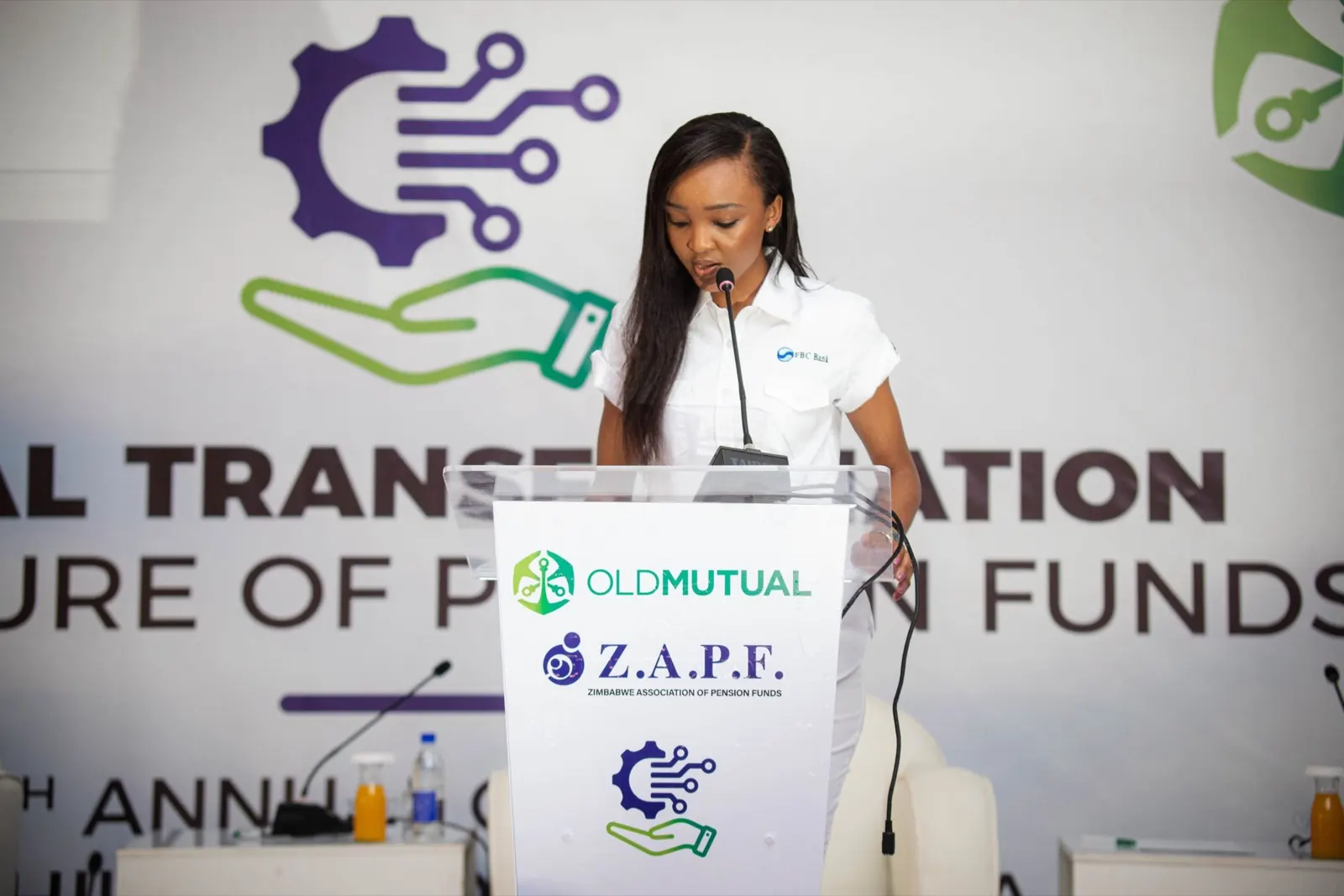 A presenter at the lectern during the digital transformation session