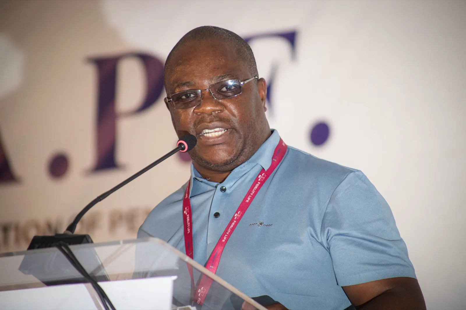 A speaker addresses delegates from the ZAPF lectern